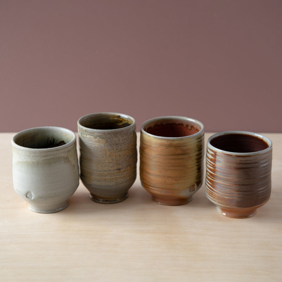 There are two different shapes of mugs from Rebekah Sweda.