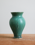 The Pewabic Green glaze is a matte blueish-green color.