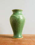 This Classic Vase features the matte organic green Ivy glaze.