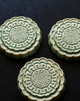 Three Mooncake Paperweights in our glossy Celadon glaze.