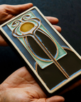 A Hand-Painted Stickley Tile in our glossy, multi-colored "Obsidian" palette.