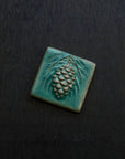 This tile features the crystalline, shimmering deep green Viridian glaze.