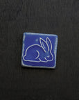 This ceramic Bunny Tile is featured in the matte Periwinkle glaze.