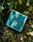 This tile features the matte turquoise Pewabic Blue glaze.