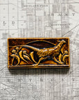 This tile features the glossy earthy brown Molasses glaze.