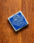 This tile features the matte bright steel blue Periwinkle Glaze.