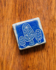 This tile features the matte bright steel blue Periwinkle Glaze.
