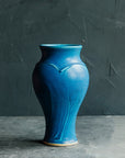 This Classic Vase features the matte french blue Peacock glaze.