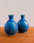 This Bud vase features the matte French blue Peacock glaze.