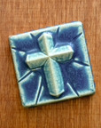 This Mario's Cross Tile features the matte french blue Peacock glaze.