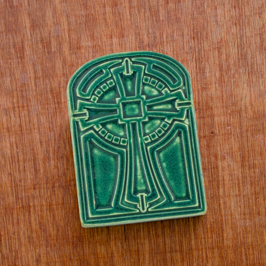 This tile features the matte blueish-green Pewabic Green glaze.