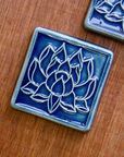 This Lotus Tile features the glossy bright blue Lake Superior.