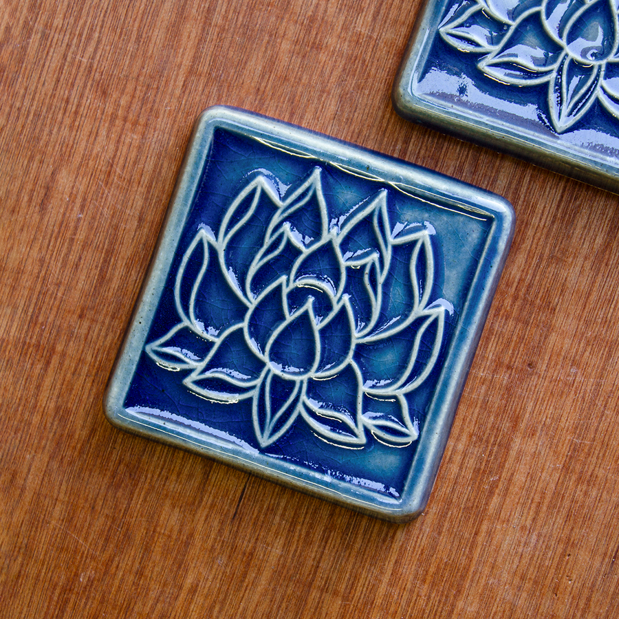 This Lotus Tile features the glossy bright blue Lake Superior.