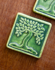 This ceramic Botanical Tree tile features the matte green Leaf glaze.