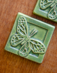 This Butterfly Tile features the matte bright light green Lime glaze.