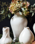 This Classic Vase features the creamy white Birch glaze that has some brown speckling.