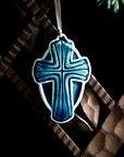 This Cross Ornament features the glossy deep blue Ocean glaze.