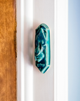 This Mezuzah features the matte turquoise Pewabic Blue glaze.