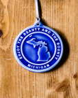 This Michigan Ornament features the glossy bright blue Lake Superior.