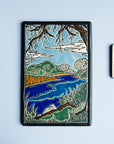 The Hand-Painted Lake Okonoka Tile.