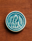 This ceramic Blessed Virgin Mary Tile is glazed in a pale blue, glossy Glacier glaze.