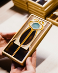 A Hand-Painted Stickley Tile in our glossy, multi-colored "Chestnut" palette.