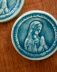 This ceramic Blessed Virgin Mary Tile is glazed in a pale blue Glacier Gloss glaze.