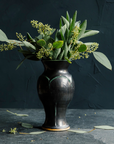 The Gun Metal glaze is a satin-finished steel black color. In areas where the glaze is thinner, like raised designs, it becomes a green color.