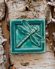 This Dragonfly Tile features the matte blueish-green Pewabic Green glaze.