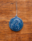 This ceramic Blessed Virgin Mary Ornament is glazed our rich, glossy, deep-blue Ocean glaze with a delicate ribbon string in shimmering taupe.