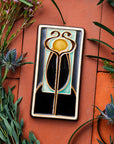 A Hand-Painted Stickley Tile in our glossy, multi-colored "Obsidian" palette.
