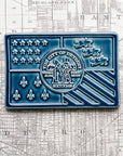 This Detroit Flag tile features the glossy deep blue Ocean glaze.