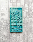 This tile features the matte turquoise Pewabic Blue glaze.