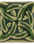 This Lover's Knot Tile features the matte organic green Leaf glaze.