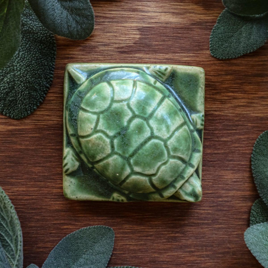 This turtle paperweight features the matte organic green Leaf glaze.