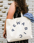 This tote has a deep blue colored logo.