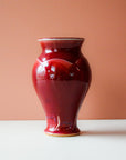 This vase features the the glossy, deep red Winterberry glaze.
