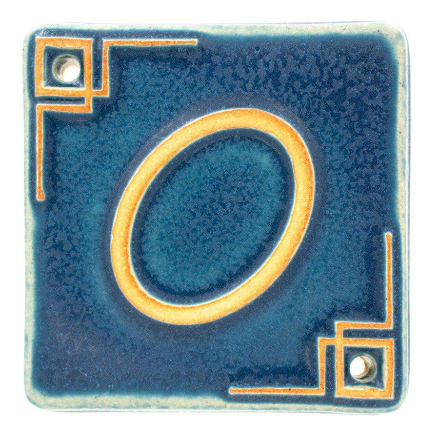 The Craftsman style ceramic 0 address number is in the matte blue Peacock glaze option.