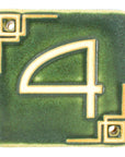 The Craftsman style ceramic 4 address number is in the matte green Leaf glaze option.