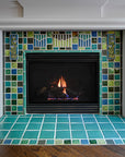 Blended blue and green fireplace and hearth.