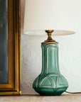 This Celtic Lamp os featured in the matte green Sorrel glaze with the cream lampshade.