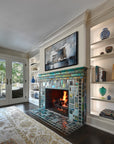 Vibrant, lit fireplace made up of Iridescent and matte glazes which creates an overall green, mirror-like effect.