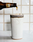 A Bell's beer is poured into a pint.