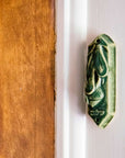 This Mezuzah features the matte organic green Leaf glaze.