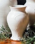 This vase features the creamy white Birch glaze that has some natural brown speckling.