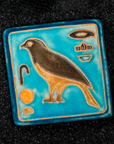 First designed in the 1920s, this hand-painted 3x3 tile depicts the bird hieroglyph Horus, the falcon-headed God of Light.