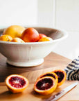 This Harvest Bowl features the creamy white Birch glaze that has some brown speckling and a gray interior color.