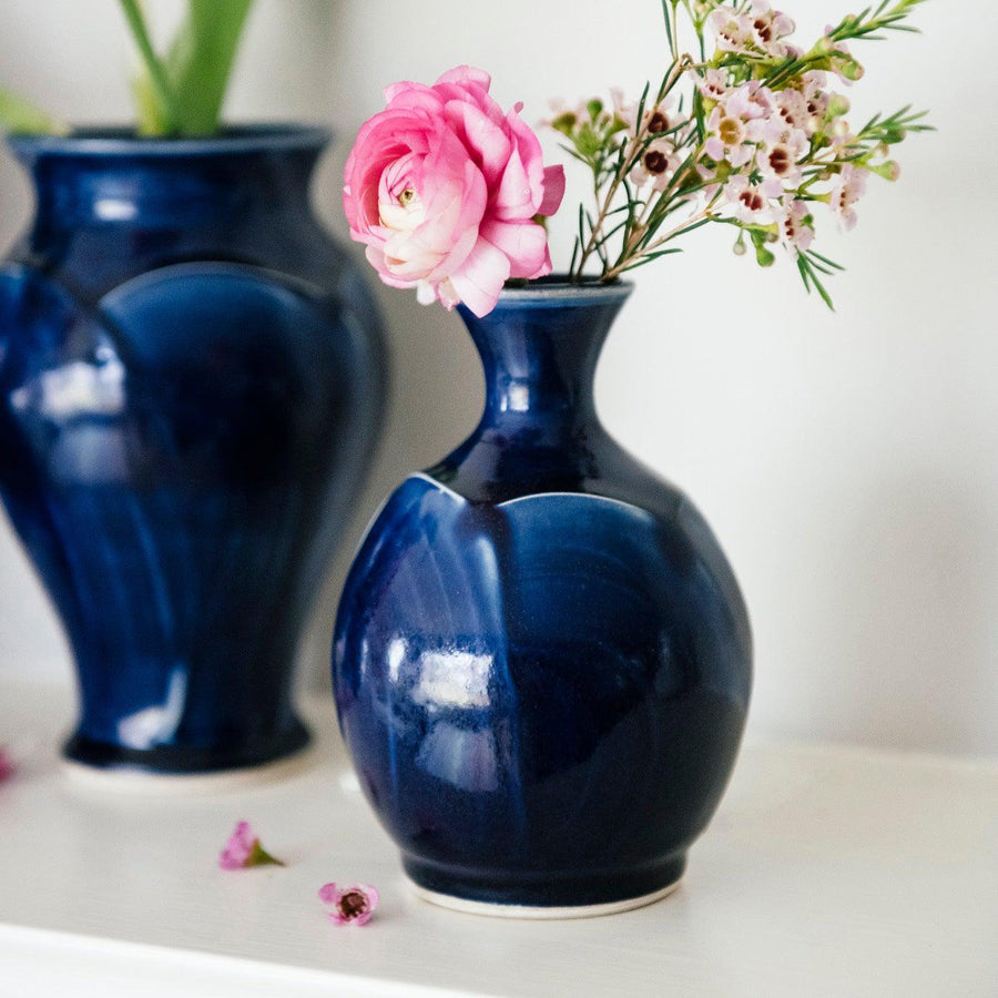 This Bud Vase features the glossy deep dark blue Midnight glaze.