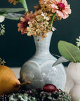 This Bud Vase features the glossy pale blue-gray Frost glaze.