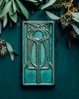 This moody tile sits among seeded eucalyptus.